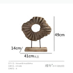 sculptures bois modernes naturel brun gris spirale franges coquillage cheval pomme bol rouleaux