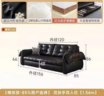 canapé lit noir simili cuir moderne coussin décoratif table basse tapis couverture