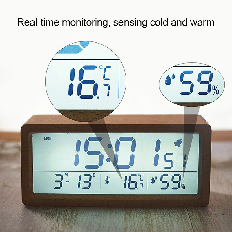 Horloge de table en bois noir affichant température et humidité