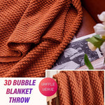 couverture lit orange motif waffle texture bulles confortable moderne canapé salon maison