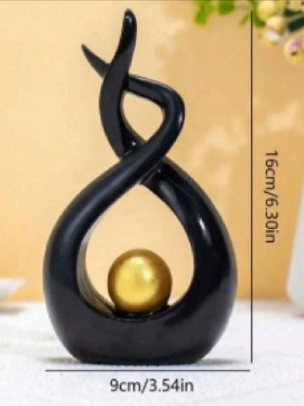sculpture décorative moderne vase abstrait noir doré sphère intégrée minimaliste ornement intérieur