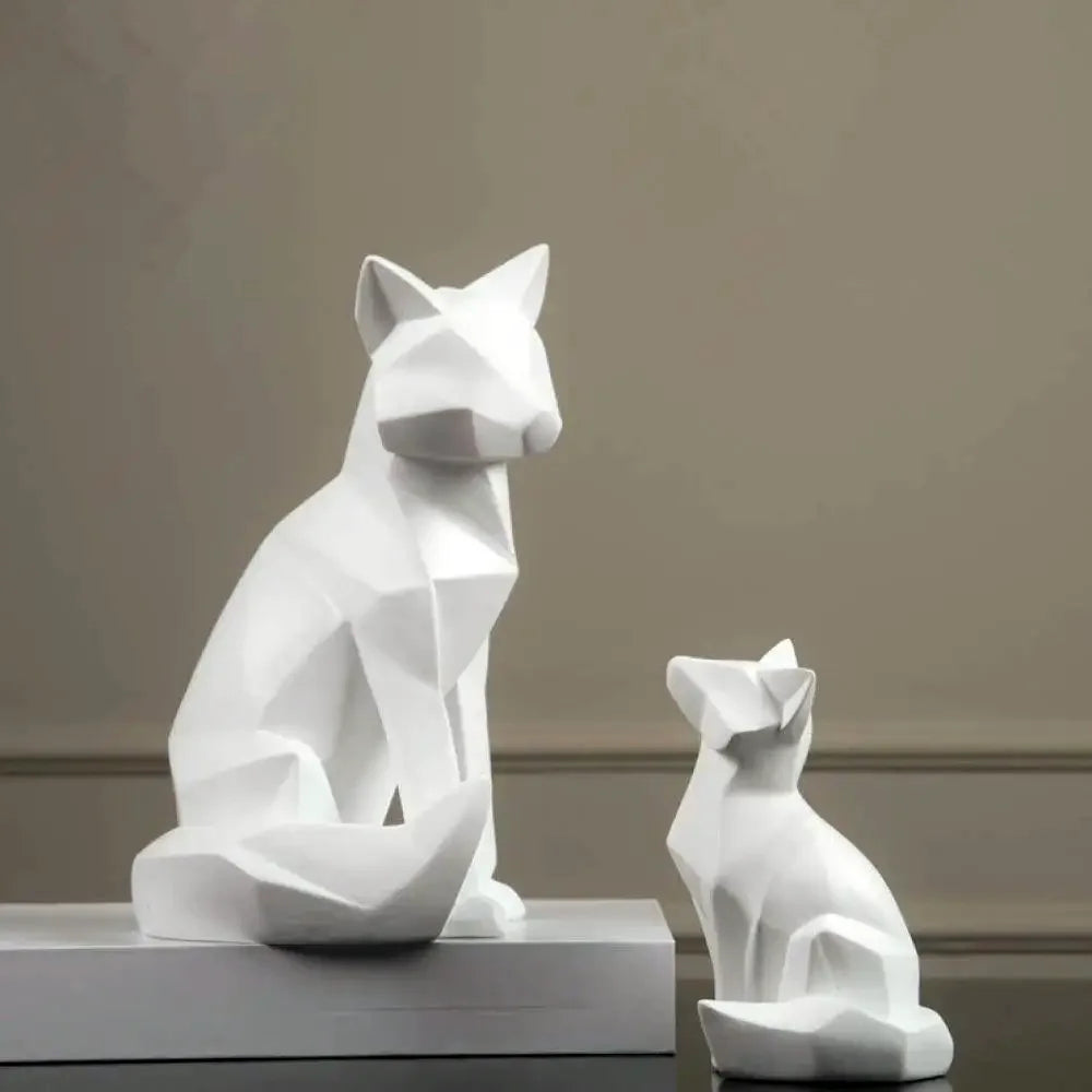 statues chats blancs polygonaux contemporains deco intérieure simple moderne minimaliste