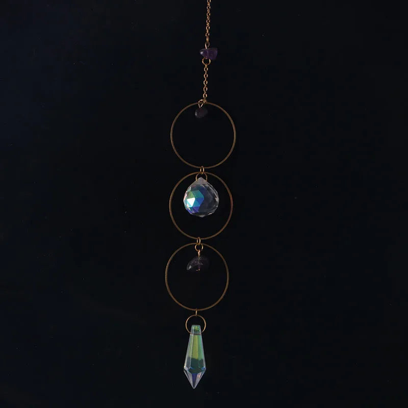 bijou pendentif cristal or bleu violet vert formes géométriques motifs oculaires translucides boho chic
