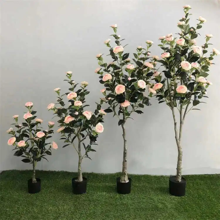 arbre artificiel vert feuilles fleurs roses blancs decoration intérieure moderne pot noir