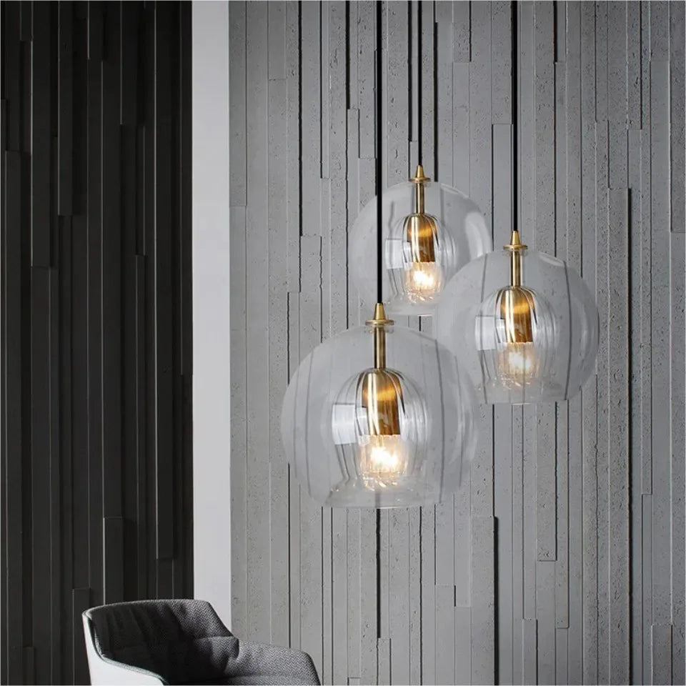 suspension lumineuse moderne transparent doré rayures verticales câble noir ampoules