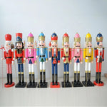 figurine soldat noel rouge blanche bleue dorée verte uniforme militaire couronne dorée moustache ruban