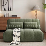 canapé lit velours vert olive moderne coussins couverture salon petit espace