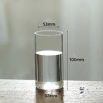 vase verre transparent moderne base bois fleurs artificielles inclusion chambre