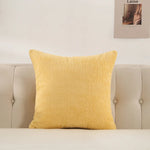 coussin peluche vert jaune rose gris clair texture bouclée moderne 60x60cm fixations
