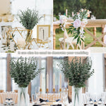 vase blanc moderne fleurs artificielles feuilles vertes décoration table intérieure
