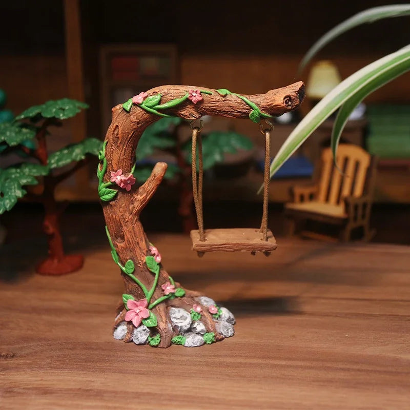 sculpture miniature artisanale arbres feuilles oiseaux balançoire pierres fleurs naturelextérieur jardin decoration résine