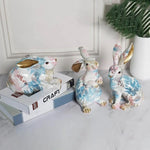 statuette lapin décorative résine peinte motifs floraux dorures modernes blanc rose bleu vert jaune
