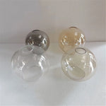 suspension boule verre moderne transparent ambre gris cognac diverse tailles