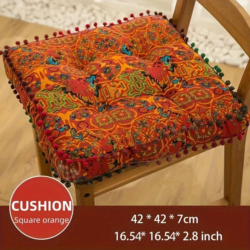 coussin carré bleu orange motif floral pompons boho chic décoration salon sol canapé
