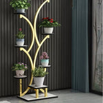 meuble plantes moderne minimaliste noir doré blanc structure arborescente plateaux simples