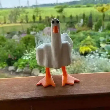 statue canard doigt levé résine blanche orange humour provocateur jardin intérieur decoration art maison