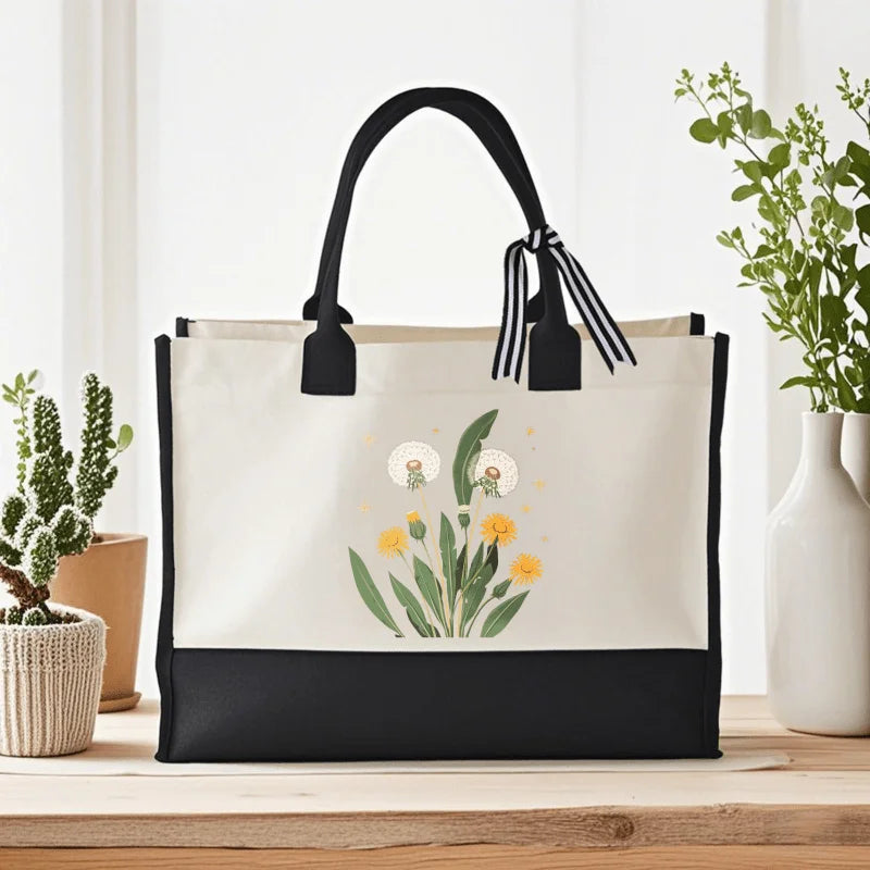 sac main toile fleurs jaunes vertes fond beige moderne poignées noires respectueux environnement réutilisable