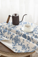 nappe ronde fleur bleue fond beige table classique mariage fêteextérieur