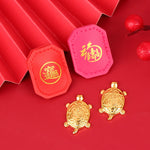 pendentif tortue dorée motif cuir rouge orné feng shui chance richesse décoration intérieure souvenir