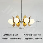 suspension lumineuse moderne sphères translucides métal doré salon chambre salle manger