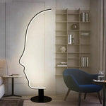 lampe sol silhouette visage humain blanc noir contemporain minimaliste interrupteur bouton aluminium