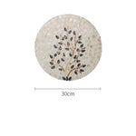 assiettes rondes mosaïque moderne blanc gris verte décoration table haut gamme motifs géométriques