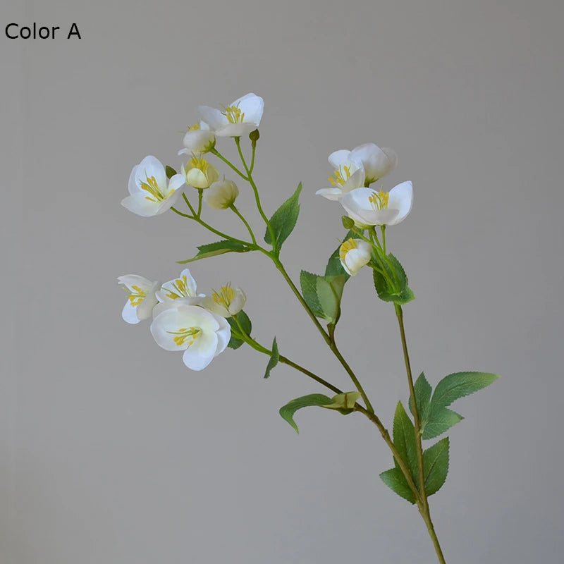 décoration intérieure moderne bouquet artificiel fleurs simples blanc vert rose violet