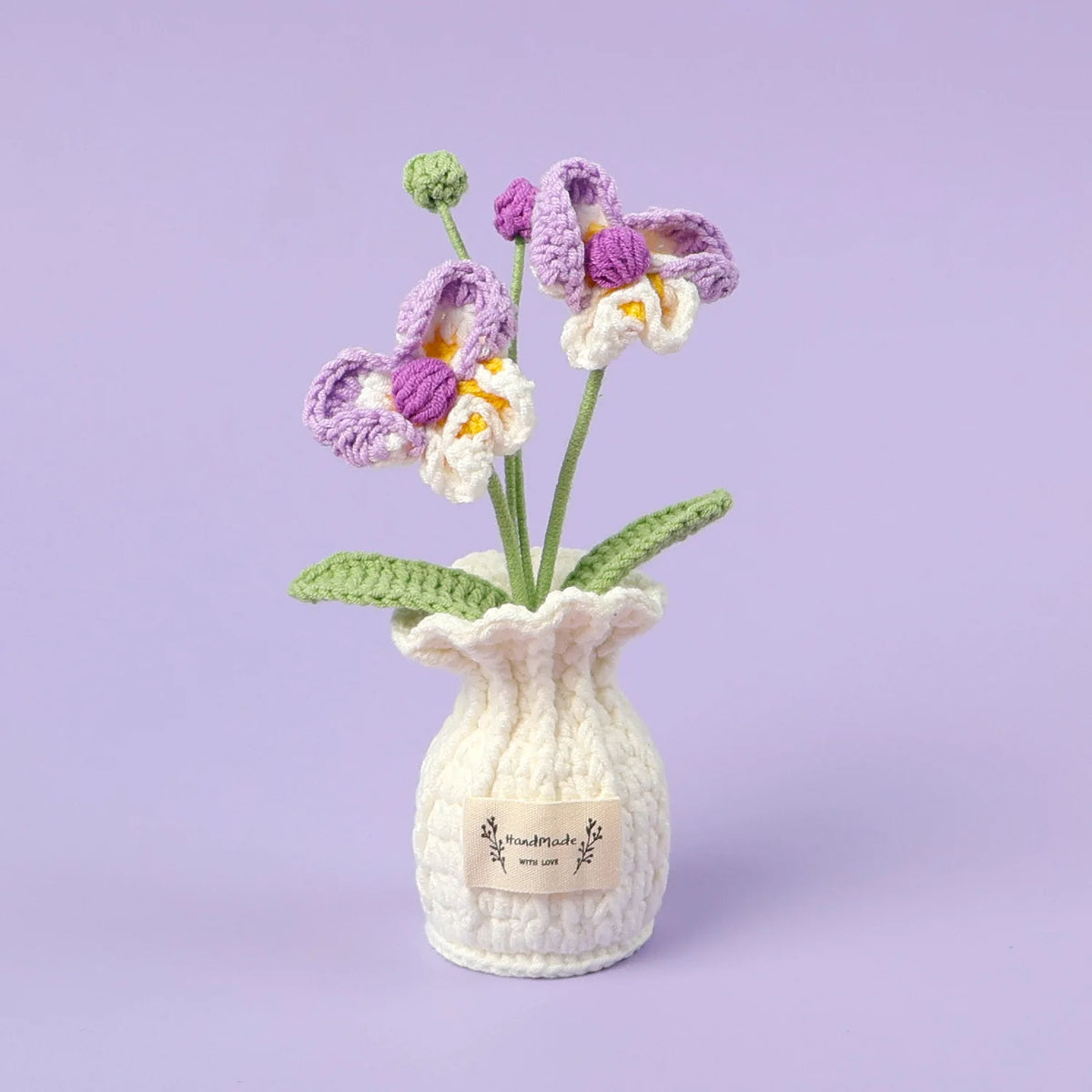 bouquet artificiel crocheté fleurs bleu rose jaune violet vase blanc décoration intérieure main ouvrière
