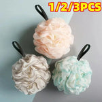 boule bain texture maille couleur beige rose vert moderne anneau noir panier blanc