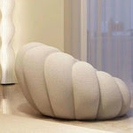 fauteuil moderne velours bouclé doux repos pieds beige clair intérieur meubles salon contemporain