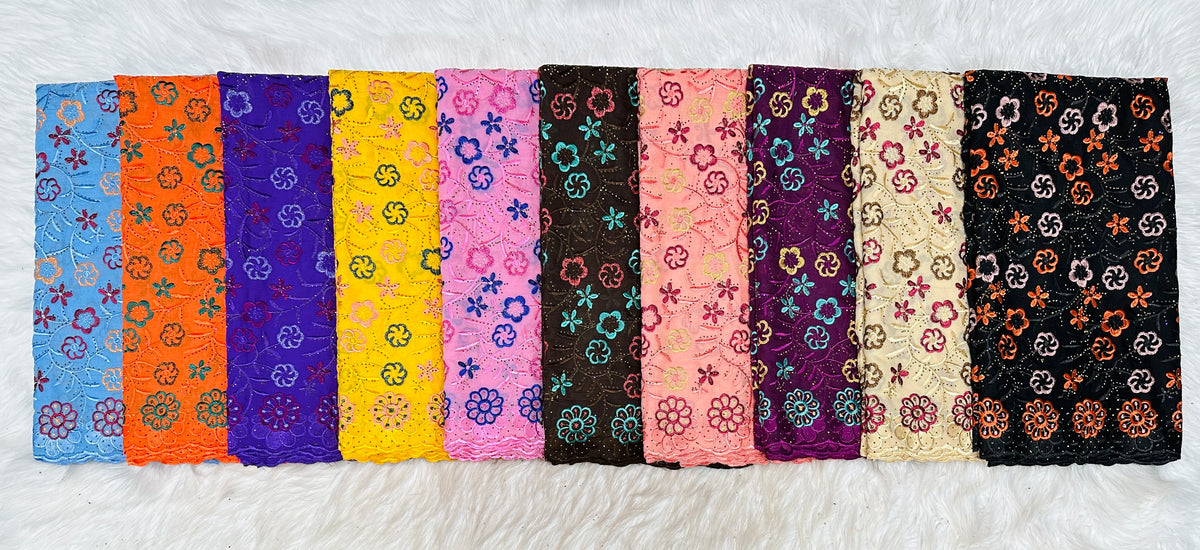 tissu dentelle coton brodé fleurs motif broderie africaine voile suisse vêtement élégant