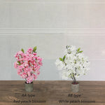 décoration intérieure plante artificielle fleurs feuilles moderne rose blanche verte salon