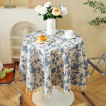 nappe ronde fleur bleue motif floral rustique franges table beige
