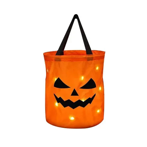 sac lumineux citrouille halloween orange noir motif yeux triangles LED enfants festif