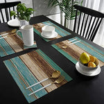 tapis table moderne rustique bleu brun beige rayures horizontales assiettes cuillères fourchettes couteaux verres