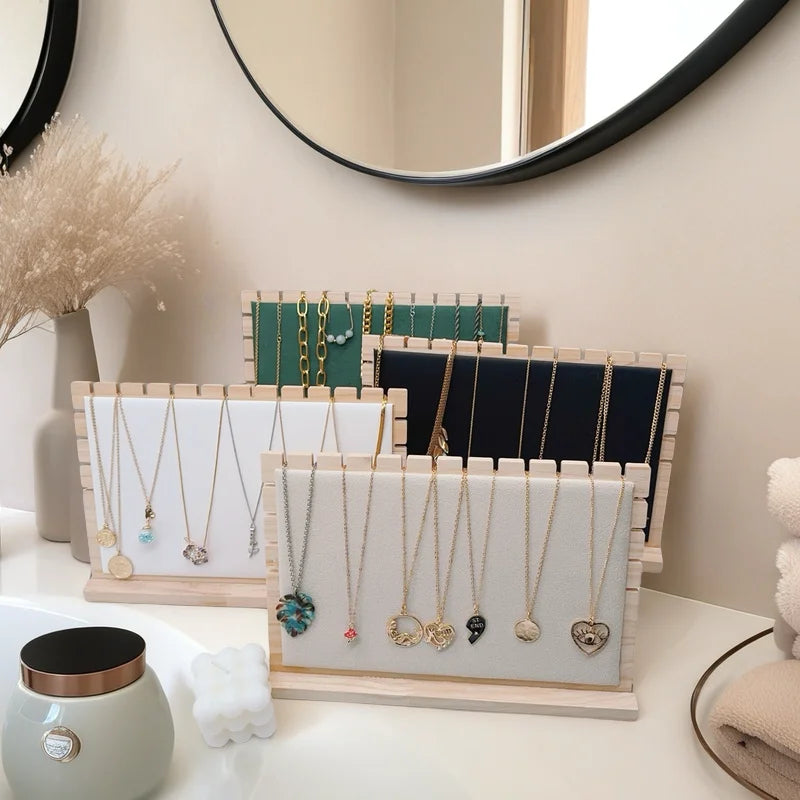 colliers exposants bois velours or argent bleu rose clips modernes minimalistes