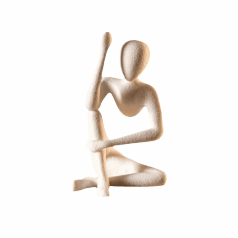 statue humaine assise vase transparent fleurs séchées moderne sculpture décorative textures granuleuses meubles bois