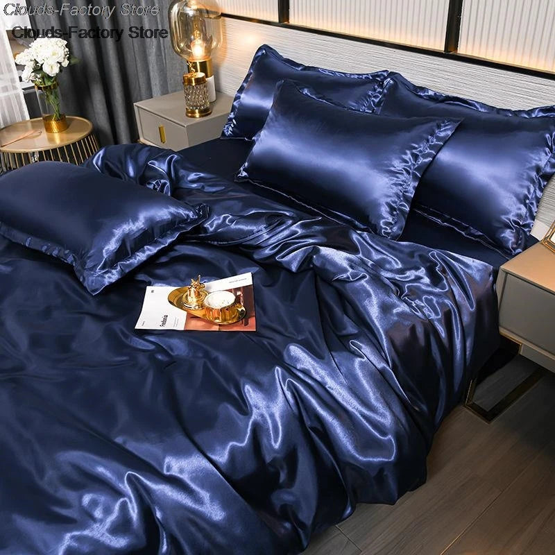 Parure de lit satin 160x200 aubergine sur un lit king size