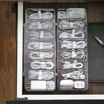 Organisation de câbles de téléphone dans une boîte transparente