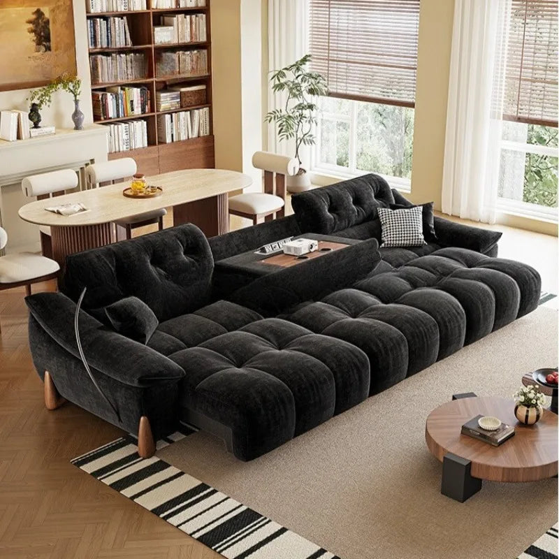 canapé d'angle noir velours moderne pieds bois coussins