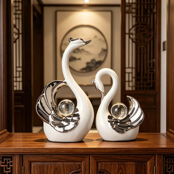 statues cygnes blanc noir cristal transparent moderne élégantes décoration intérieure table basse chambre salon