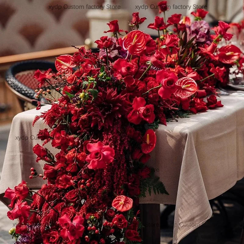 décoration événement mariage anniversaire rose anthuriums dahlia feuillage dense nappe tissu