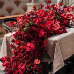 décoration événement mariage anniversaire rose anthuriums dahlia feuillage dense nappe tissu