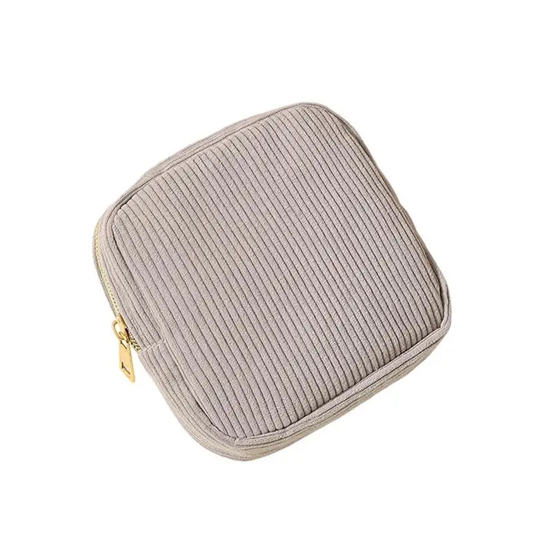 sac rangement serviettes hygiéniques réutilisable broderie fleurs animaux quadrillée fermeture glissière beige clair