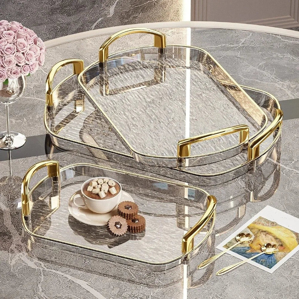 plateau rectangulaire moderne élégant poignées métalliques transparent doré texture marbrée bijoux parfums tasses