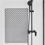 Tapis de bain en TPE disponible en multiple couleurs : bleu, rose, rouge