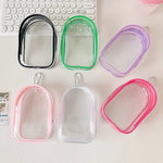 sac main transparent moderne cordon serrage noir vert rose violet minimaliste