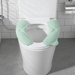 siège toilette amovible vert pastel antidérapant moderne adhésif poignée intégrée lavable réutilisable chambre