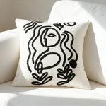 housse coussin décorative polyester coton blanc noir motif carreaux contemporain respectueux environnement maison hospitalière