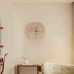 lampe murale horloge ronde pierre texturée minimaliste contemporaine led beige clair marron salle manger